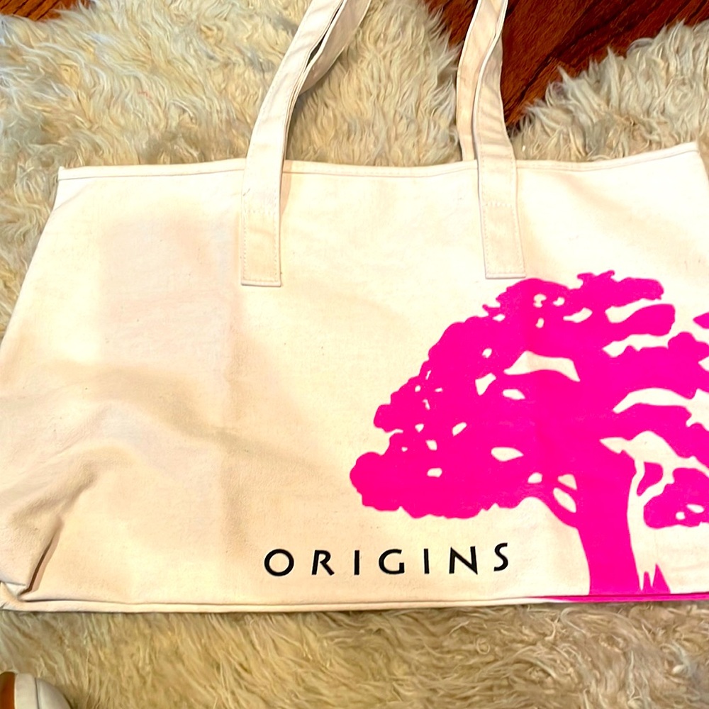 Origins canvas tote. New with tags. Has a slight spot on one side, see photo.